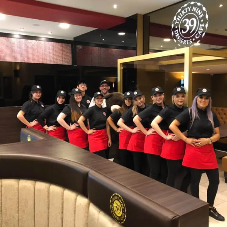elegant staff posing for picture